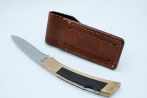 Gerber Portland Sportsman Lockback — Brass Frame, Ebony Inlay, Original Leather Sheath, 1970s–80s USA